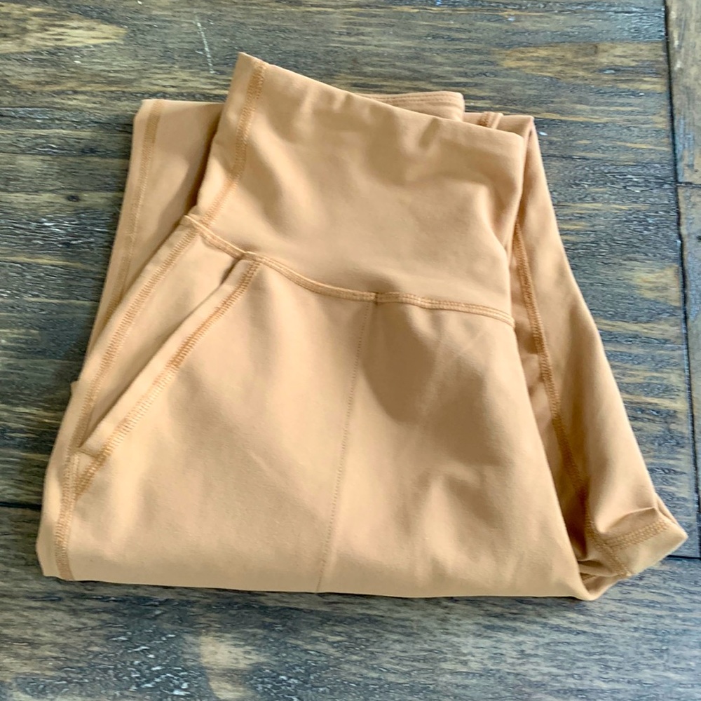 Tan/brown joggers with pockets.
